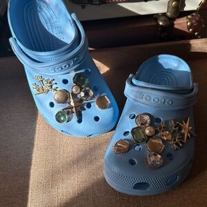 Blue Crocs with Gold Jibbitz